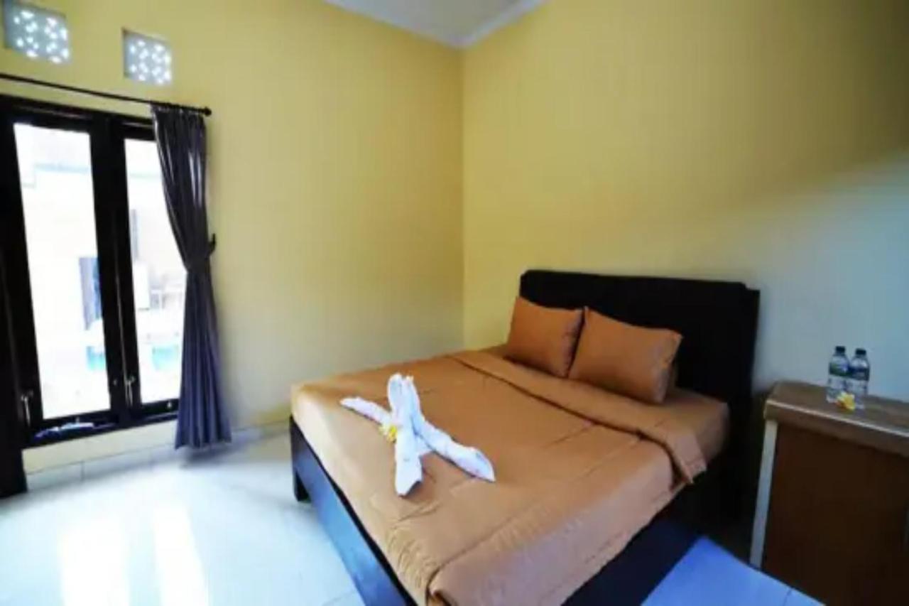 Oyo Flagship 91237 Ratu Guest House Kedunganan Eksteriør billede