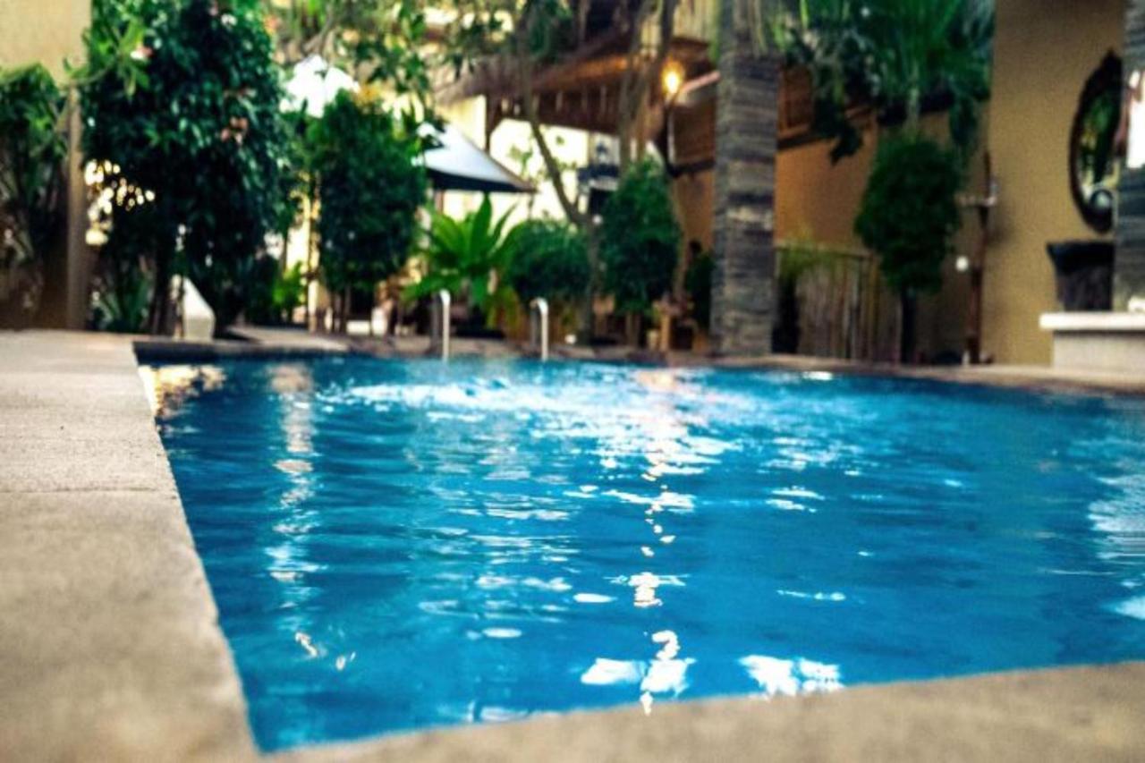 Oyo Flagship 91237 Ratu Guest House Kedunganan Eksteriør billede