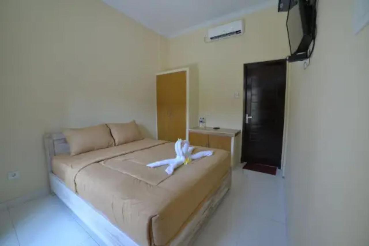 Oyo Flagship 91237 Ratu Guest House Kedunganan Eksteriør billede