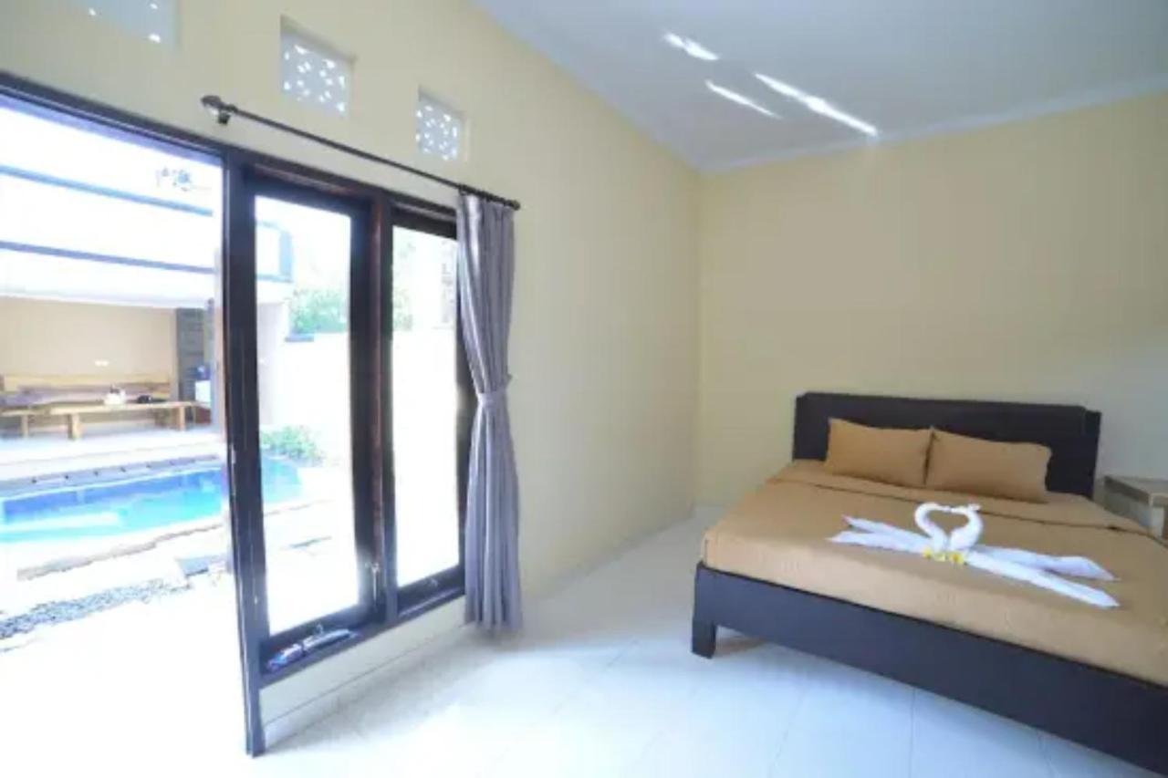Oyo Flagship 91237 Ratu Guest House Kedunganan Eksteriør billede