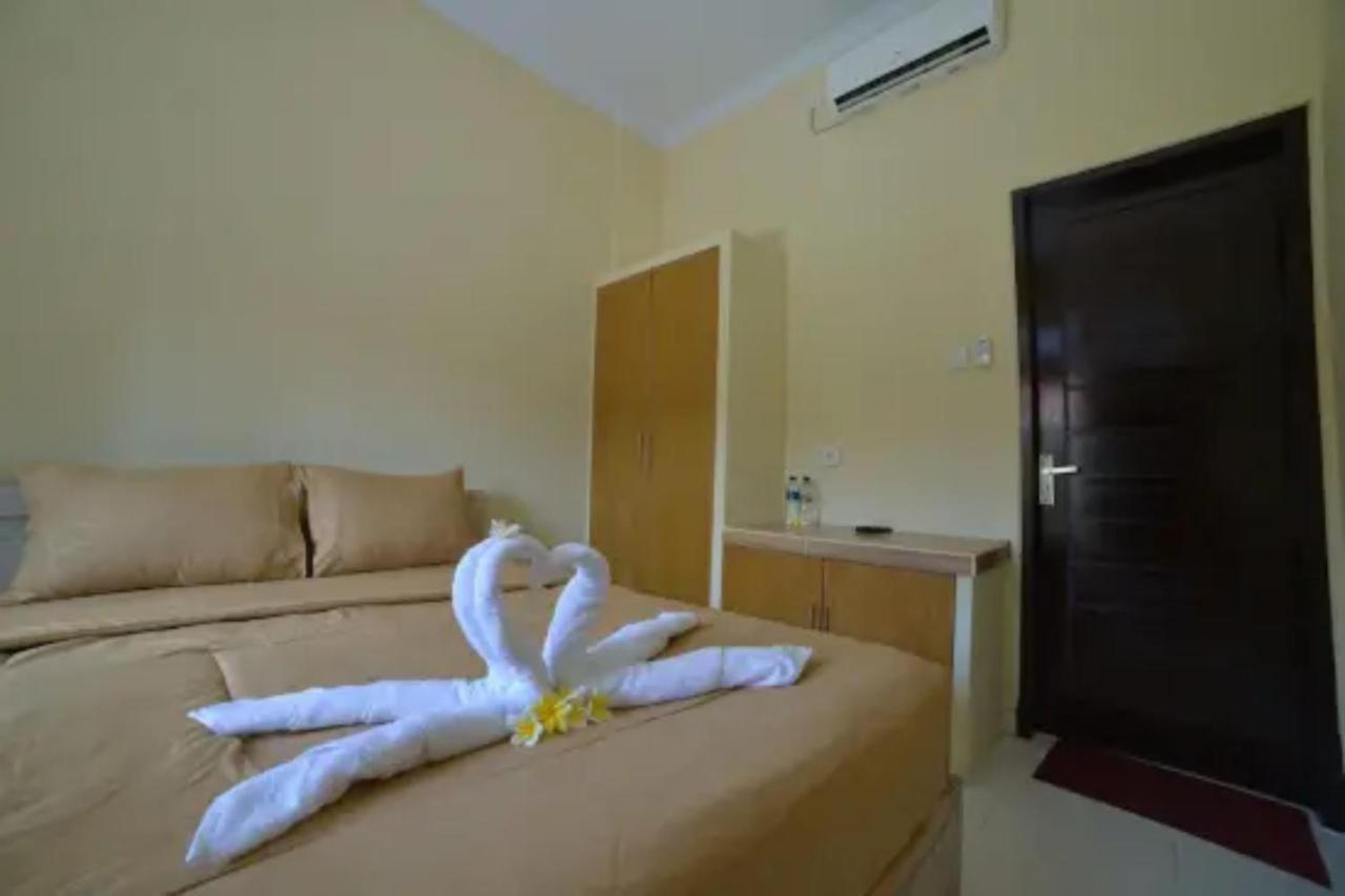 Oyo Flagship 91237 Ratu Guest House Kedunganan Eksteriør billede