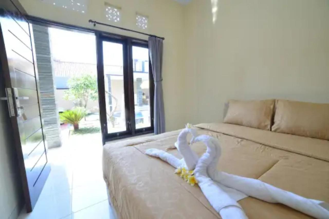 Oyo Flagship 91237 Ratu Guest House Kedunganan Eksteriør billede