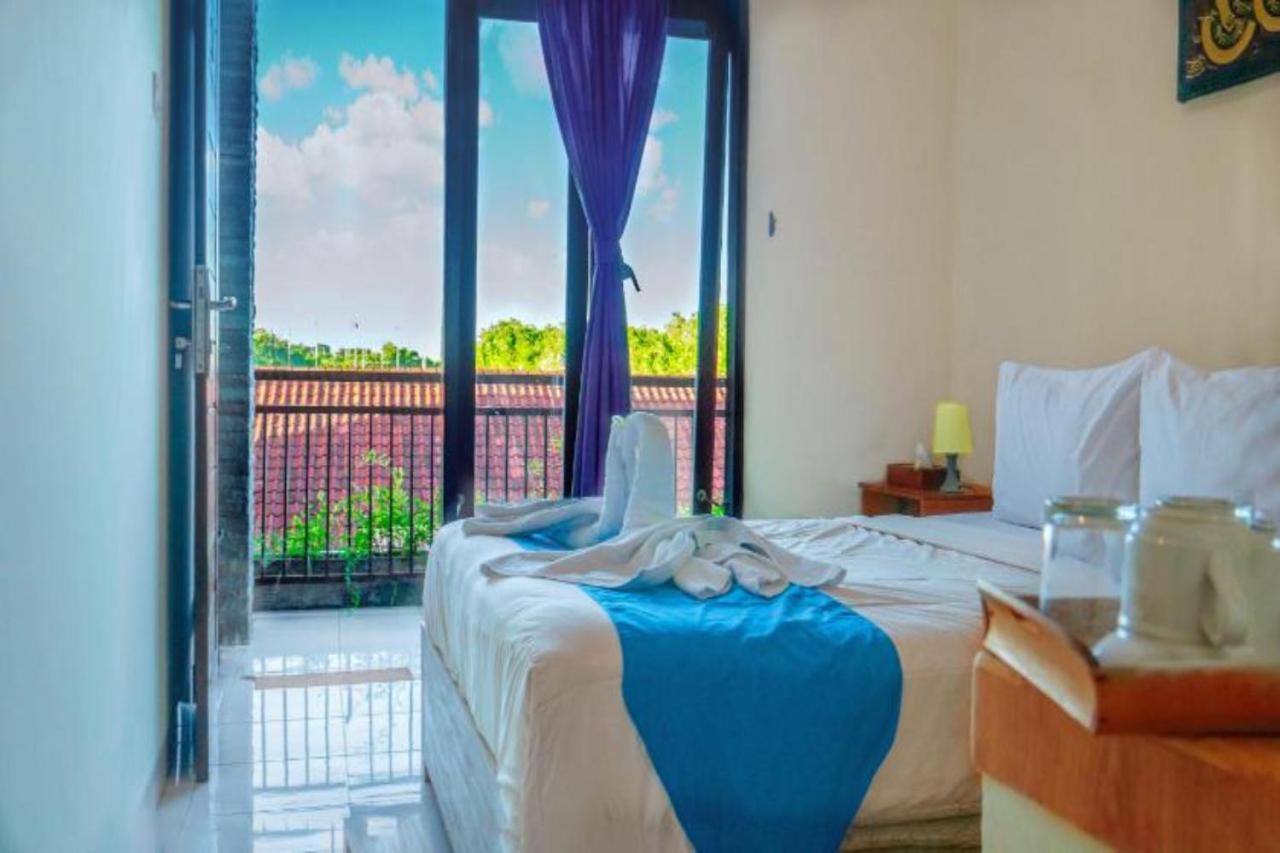 Oyo Flagship 91237 Ratu Guest House Kedunganan Eksteriør billede